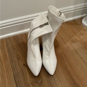 White faux leather ankle boots